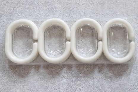 Білі кільця для штор набір 12 шт. в блістері Білі кільця для штор набір 12 шт. в блістері