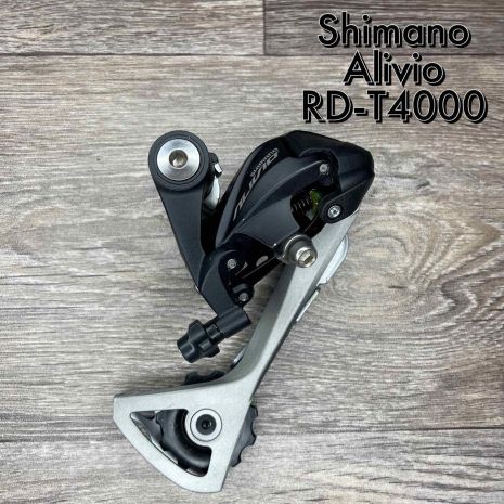 Переключатель задний Shimano RD-T4000 ALIVIO черный 9-ти скоростной ,крепление под болт