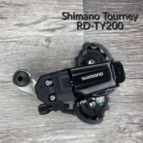 Задній перемикач Shimano Tourney RD-TY200-SS-D 6/7-speed, коротка лапка, під болт, на півень, RDTY200SSLD