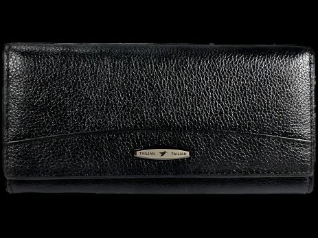 Жіночий шкіряний гаманець чорного кольору з кнопковою застібкою та монетницею