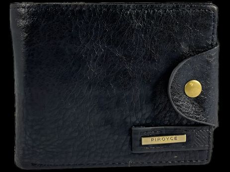 Чоловічий гаманець чорного кольору на кнопковій застібці з відділенням для монет