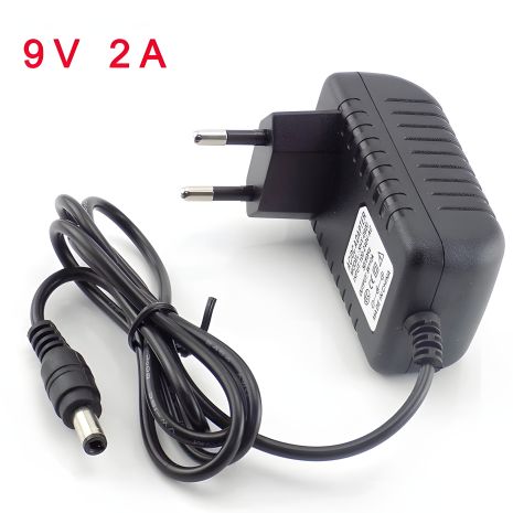 Адаптер/Блок питания 9V 2A AC-DC 5.5x2.5mm | Для камер, тюнера, ресивера, ИБП и устройств с DC питанием 9V до 2A | Black Адаптер/Блок питания 9V 2A AC-DC 5.5x2.5mm | Для камер, тюнера, ресивера, ИБП и устройств с DC питанием 9V до 2A | Black