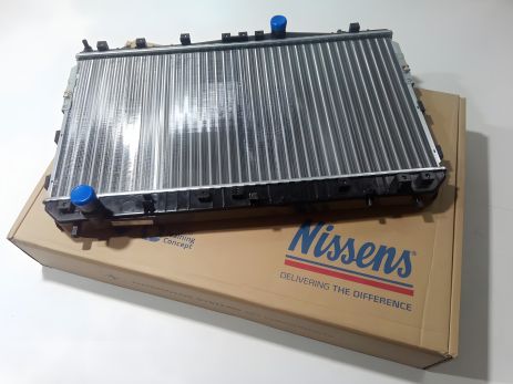 Охолоджувальний радіатор Lacetti (МКПП), NISSENS (61633) (96553378) Охолоджувальний радіатор Lacetti (МКПП), NISSENS (61633) (96553378)