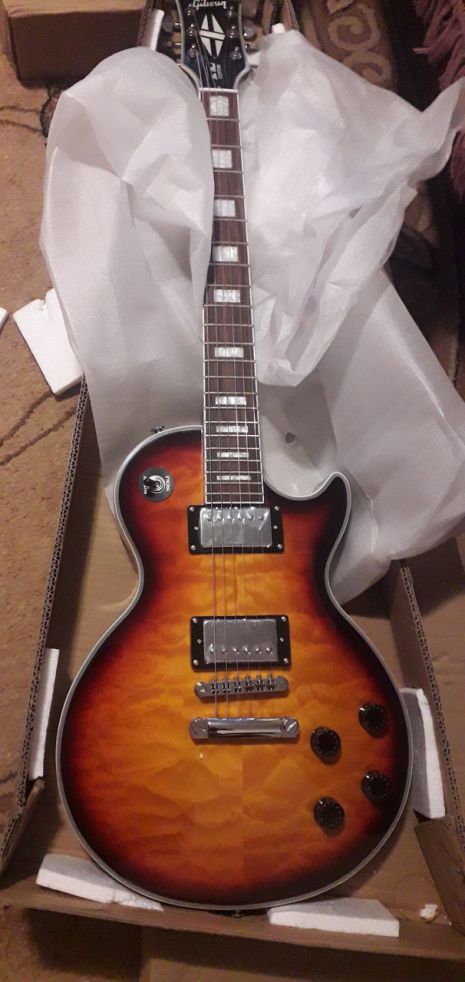 Электрогитара Gibson Les Paul Custom Sunburst Lux China