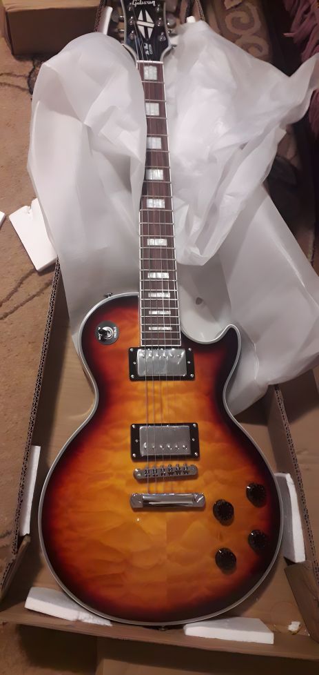 Електрогітара Gibson Les Paul Custom Sunburst Lux China Електрогітара Gibson Les Paul Custom Sunburst Lux China