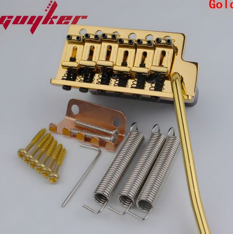 Тремоло бридж Guyker для електрогітари stratocaster gold Тремоло бридж Guyker для електрогітари stratocaster gold
