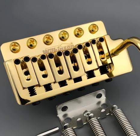 Тремоло бридж Wilkinson для електрогітари stratocaster gold Тремоло бридж Wilkinson для електрогітари stratocaster gold