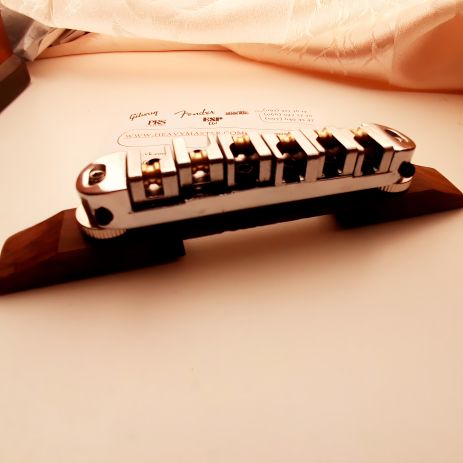 Струнотримач бридж для акустичних та напівакустичних гітар роликовий