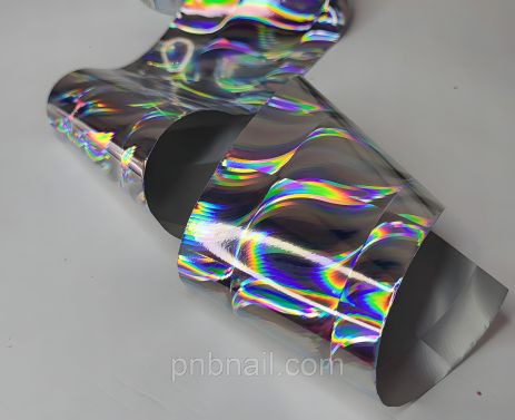 Фольга для дизайну нігтів срібна хвиля, 1 м Фольга для дизайну нігтів срібна хвиля, 1 м