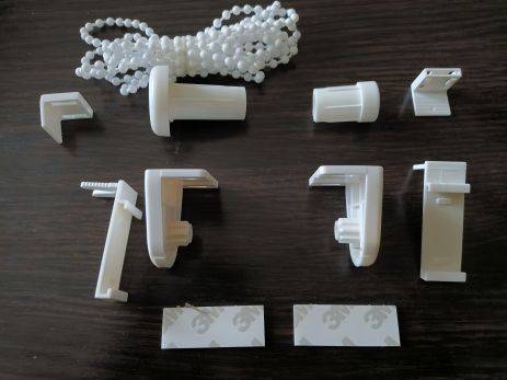 Механізм управління рулонною міні-шторою