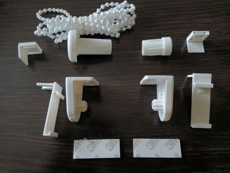 Механізм управління рулонною міні-шторою