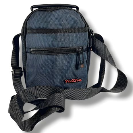 Компактная и удобная синяя сумка через плечо