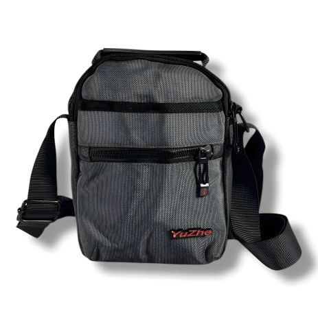 Компактная серая сумка через плечо, удобная и стильная