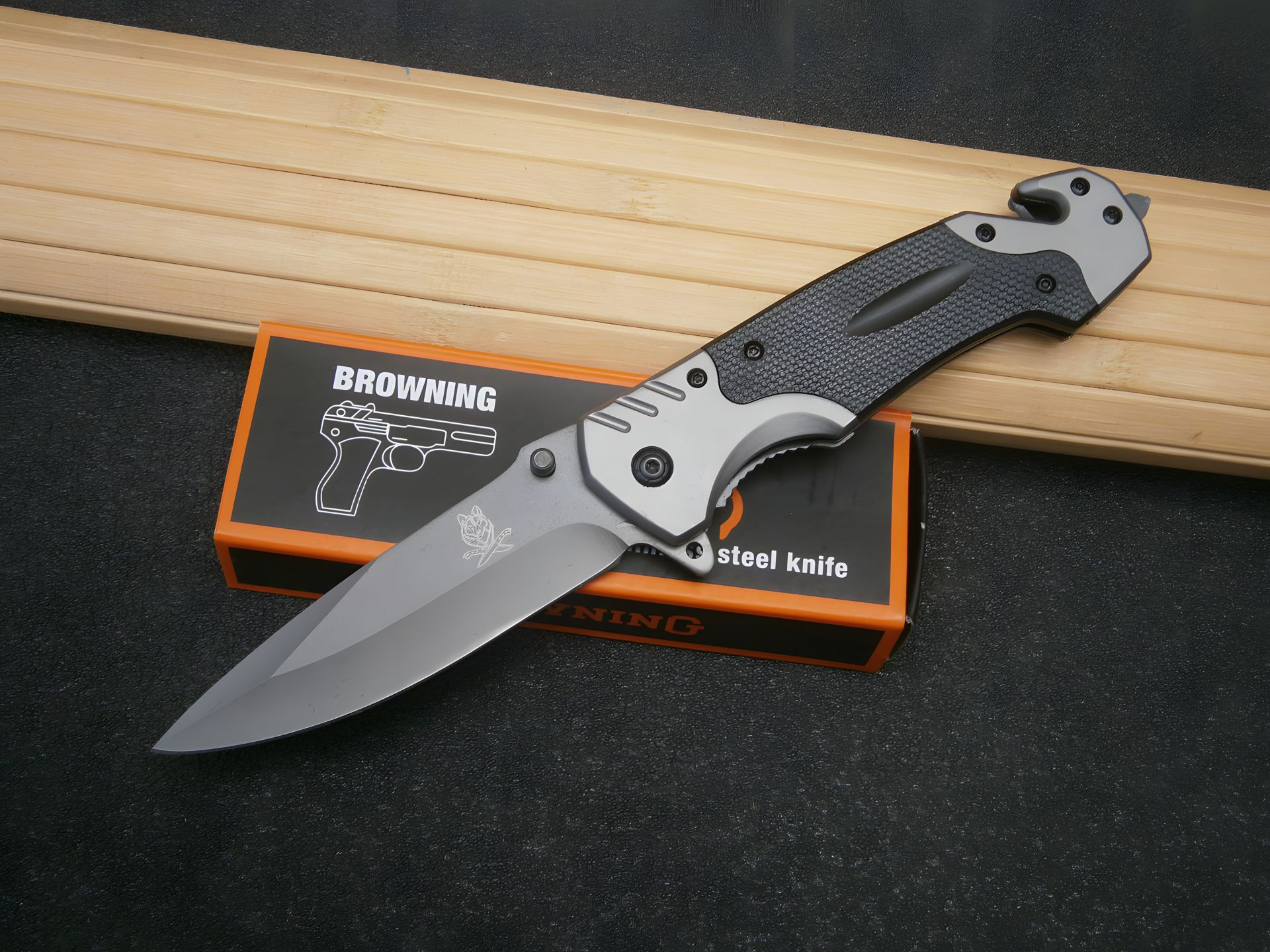 Складаний ніж Browning АК 50 з склобієм та стропорізом, 23 см Складаний ніж Browning АК 50 з склобієм та стропорізом, 23 см