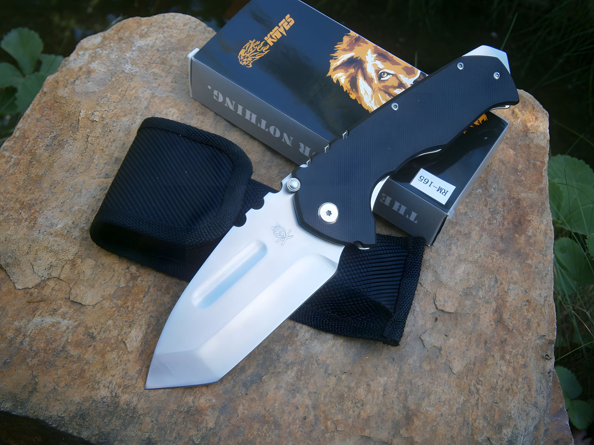 Складной нож "Лев" RM-160 US Tanto, битое стекло, 23 см, черный Складной нож "Лев" RM-160 US Tanto, битое стекло, 23 см, черный