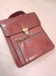 Коричневая кожаная мужская барсетка б/у