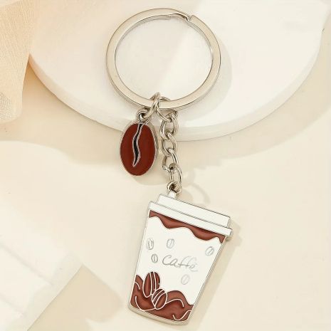 Брелок у вигляді чашки кави і кавове зерно для кавоманів Брелок у вигляді чашки кави і кавове зерно для кавоманів