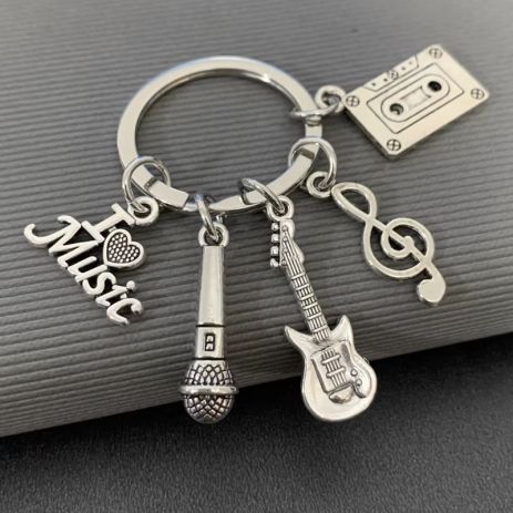 Брелок на музыкальную тематику гитара скрипичный ключ микрофон музыкальные инструменты