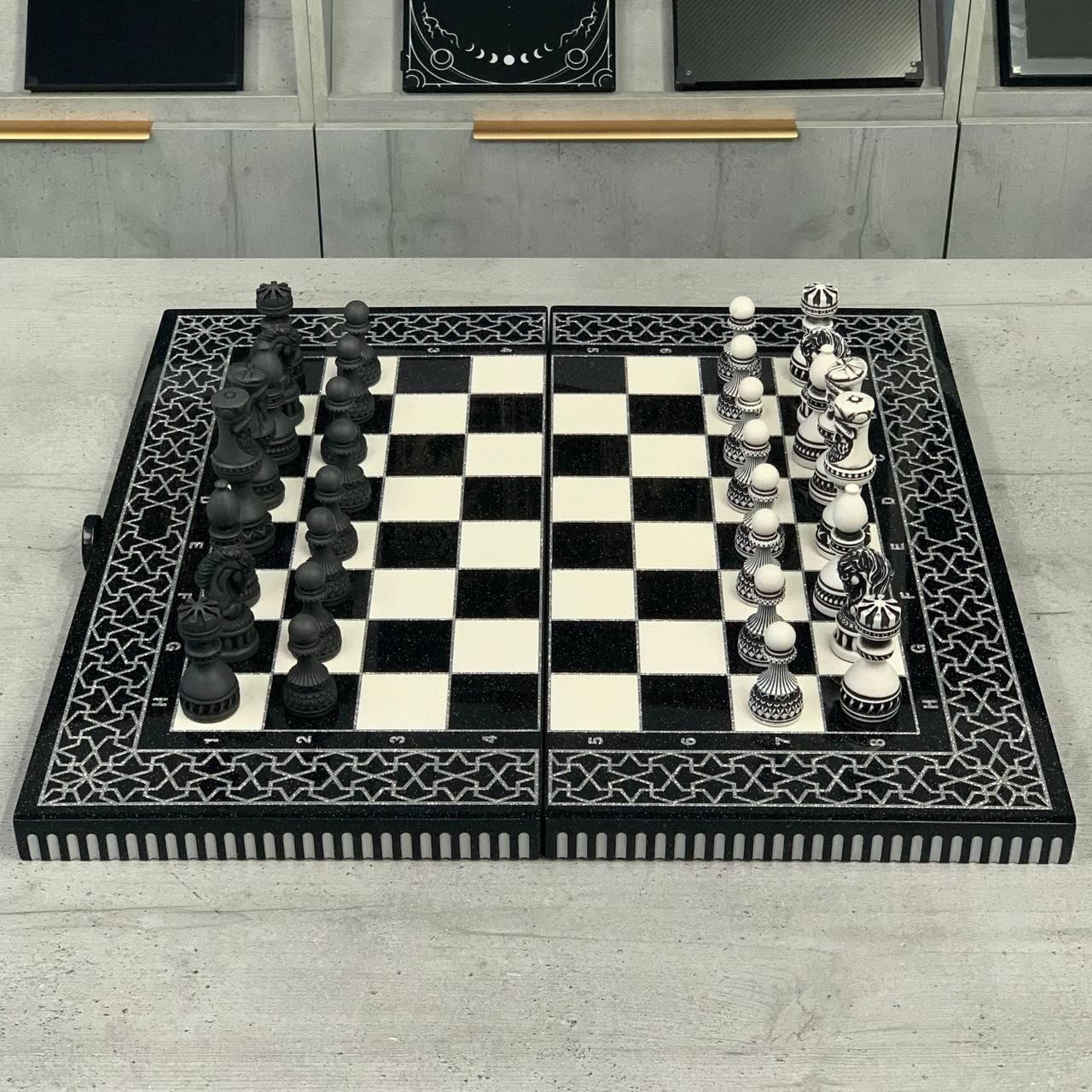 Шахматы из камня 55×28×10см со стилизованными фигурами Шахматы из камня 55×28×10см со стилизованными фигурами