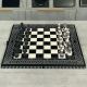 Шахматы из камня 55×28×10см со стилизованными фигурами Шахматы из камня 55×28×10см со стилизованными фигурами