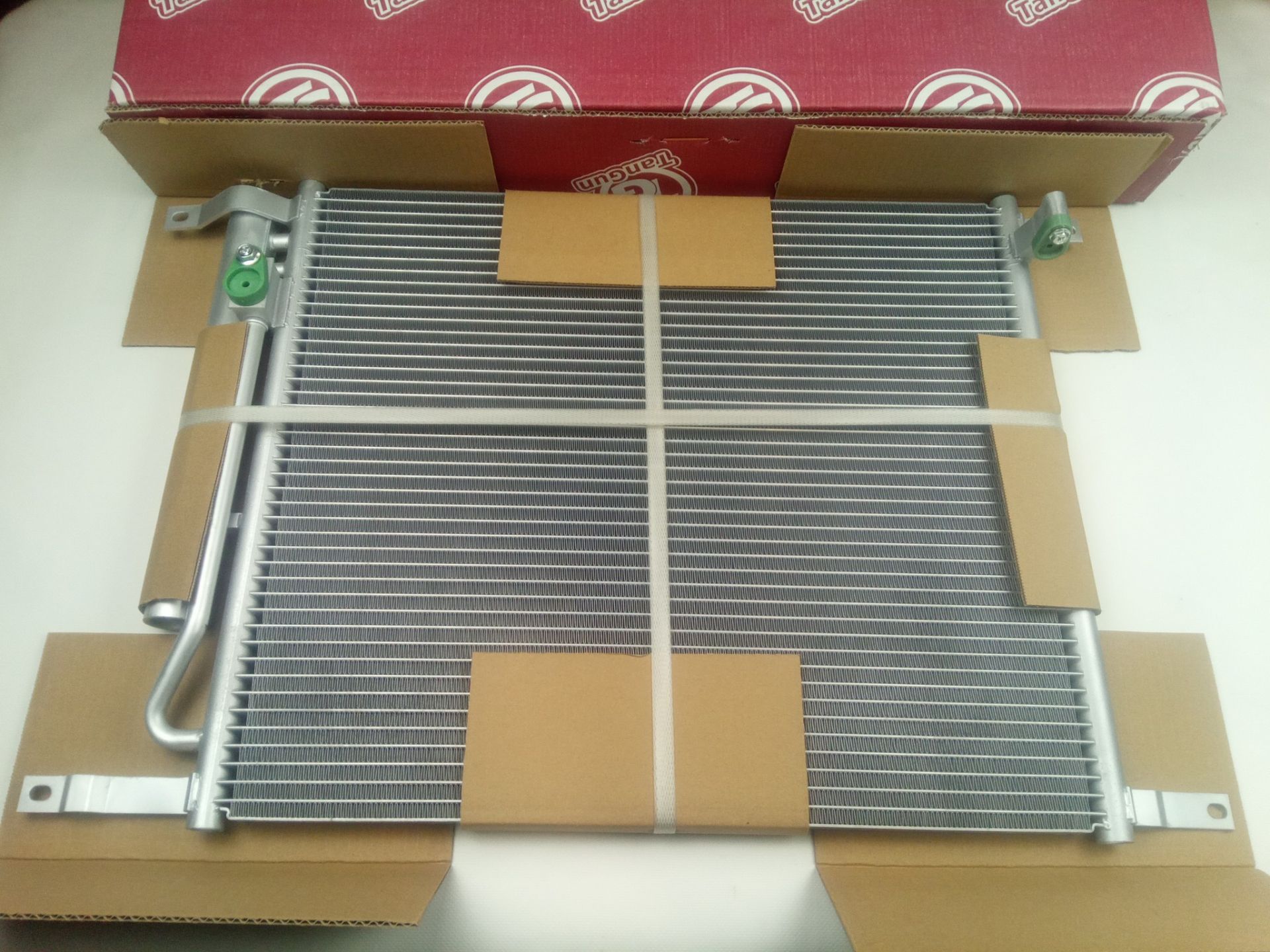 Радиатор кондиционера Aveo 08-, TANGUN (P12208) с ресивером (95227758/94838818/9680295) Радиатор кондиционера Aveo 08-, TANGUN (P12208) с ресивером (95227758/94838818/9680295)