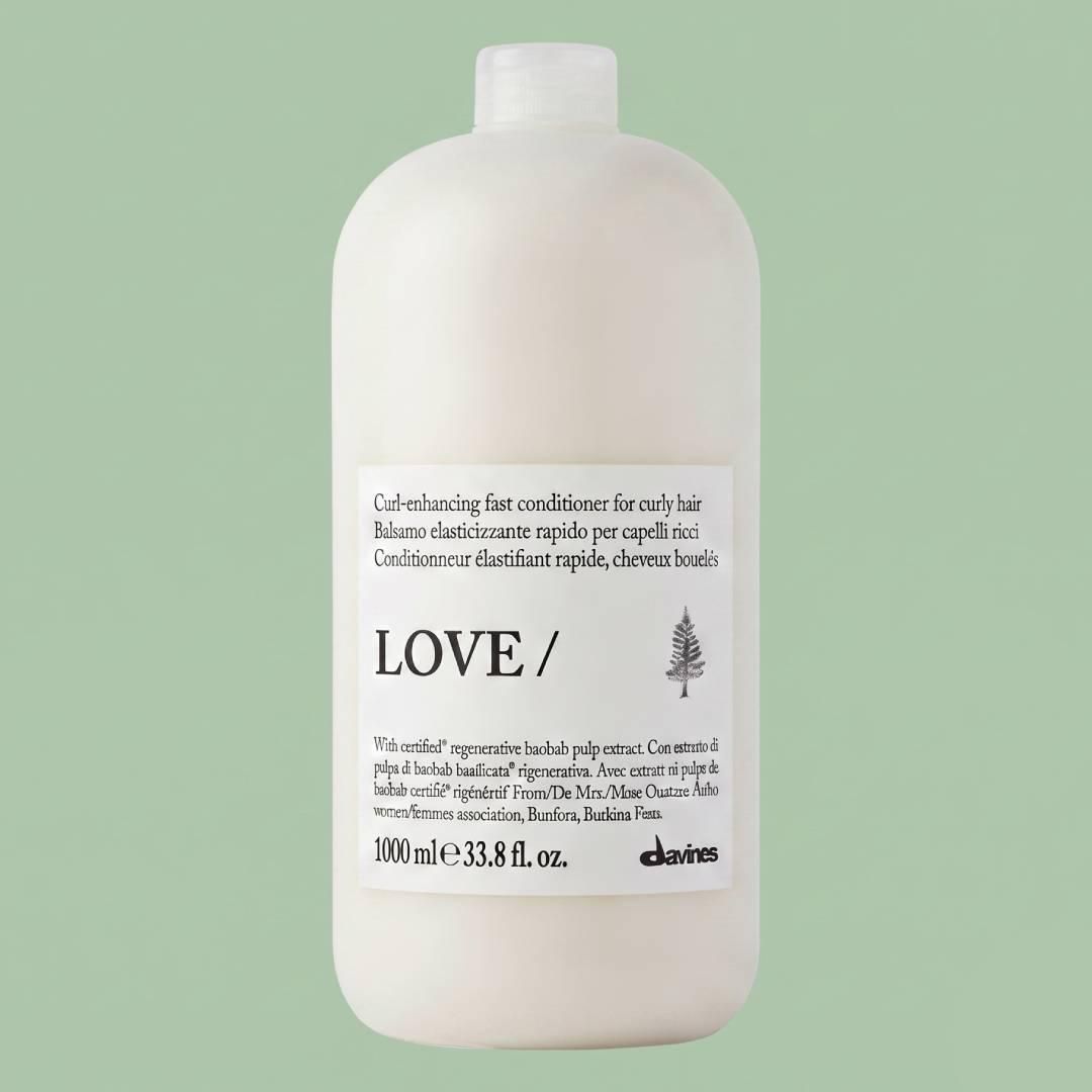 Кондиционер Davines Essential Love Curl Conditioner для усиления завитка кучерявых волос, 1000 мл Кондиционер Davines Essential Love Curl Conditioner для усиления завитка кучерявых волос, 1000 мл