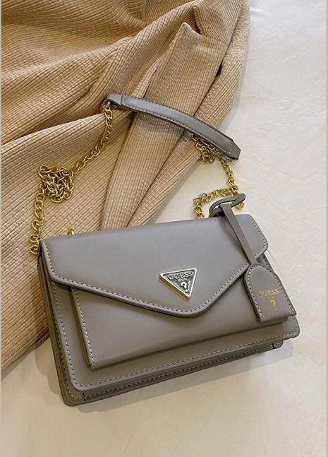 Жіноча сумка Guess 18091 крос-боді сіра Жіноча сумка Guess 18091 крос-боді сіра