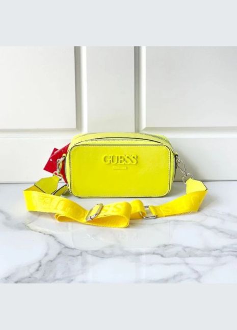 Женская прямоугольная сумка Guess кросс-боди на ремешке желтая