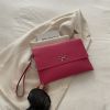 Жіноча класична сумка клатч 1745 на ремінці рожева Жіноча класична сумка клатч 1745 на ремінці рожева