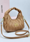 Жіноча сумка багет Miu miu 18121 бежева