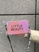 Жіноча голографічна сумка крос-боді через плече LITTLE BEAUTY рожева Жіноча голографічна сумка крос-боді через плече LITTLE BEAUTY рожева
