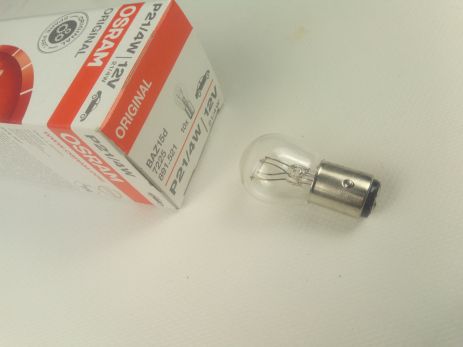 Лампа з цоколем OSRAM 12V P21/4W (7225) (10 шт. в уп.) зі зміщеним вусиком (722502B) ціна за 1 шт